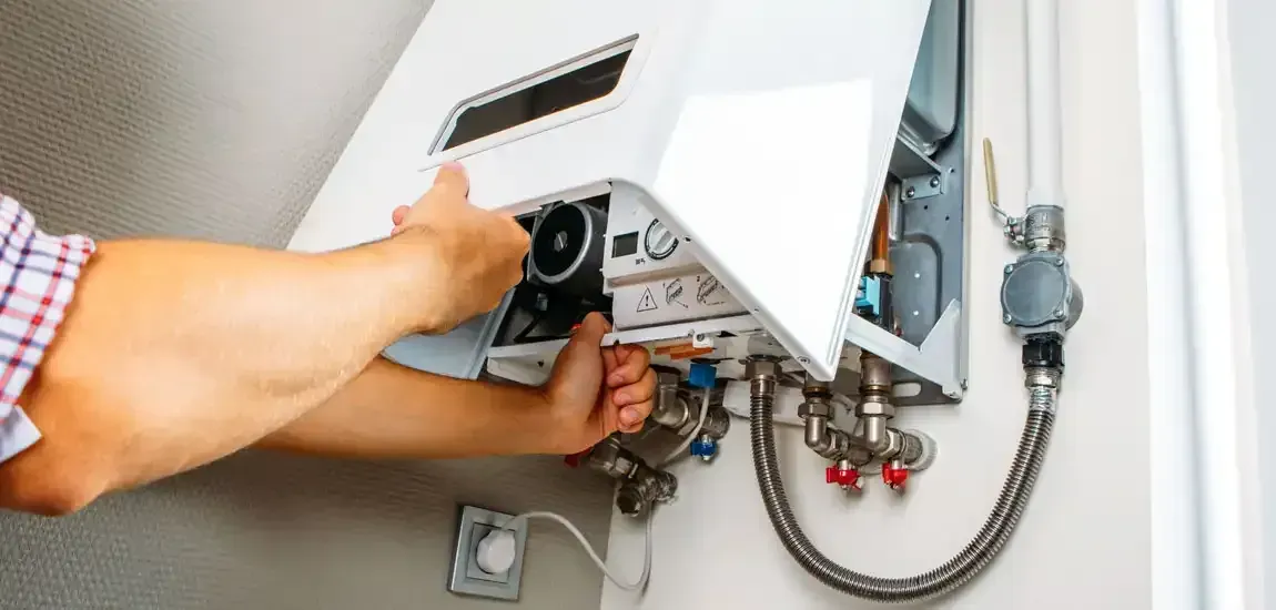 Water heater installed in a home utility space.